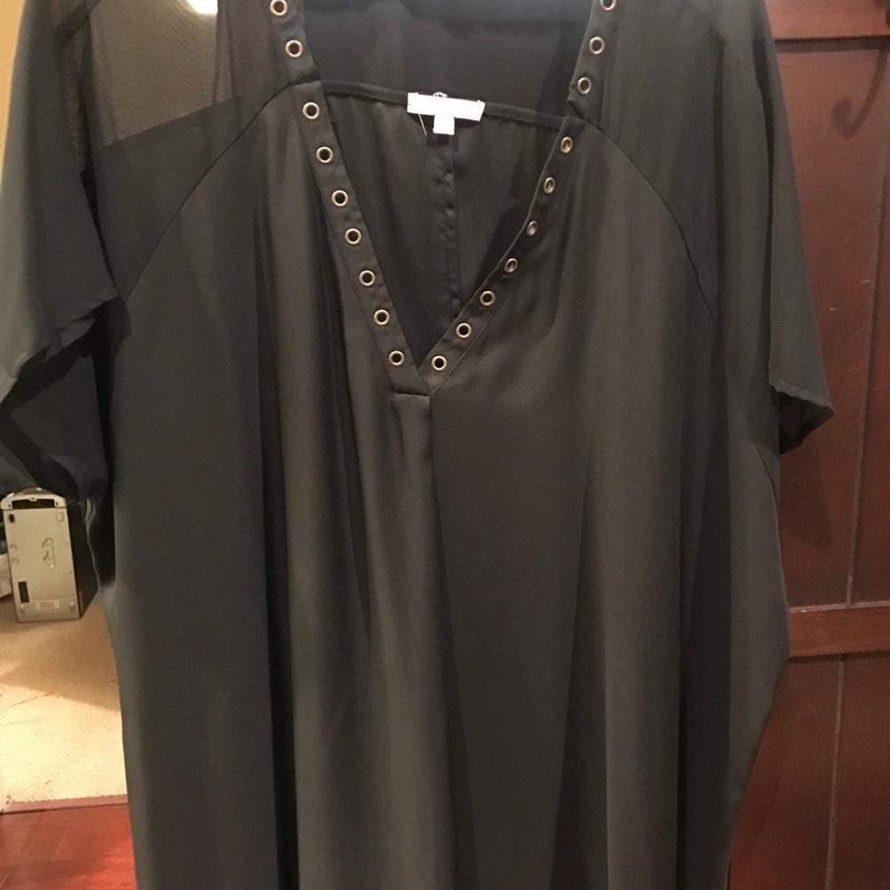 See through black blouse.